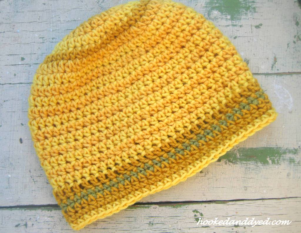 Hat crocheted using yarn dyed with Gymnopilus spectabilis and Phaelous schweinitzii