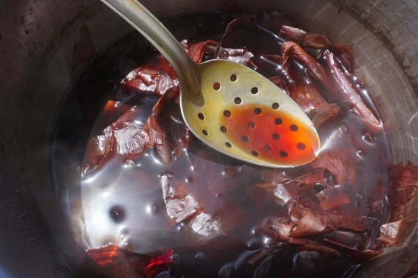 The color of red onion dye after boiling for several hours.